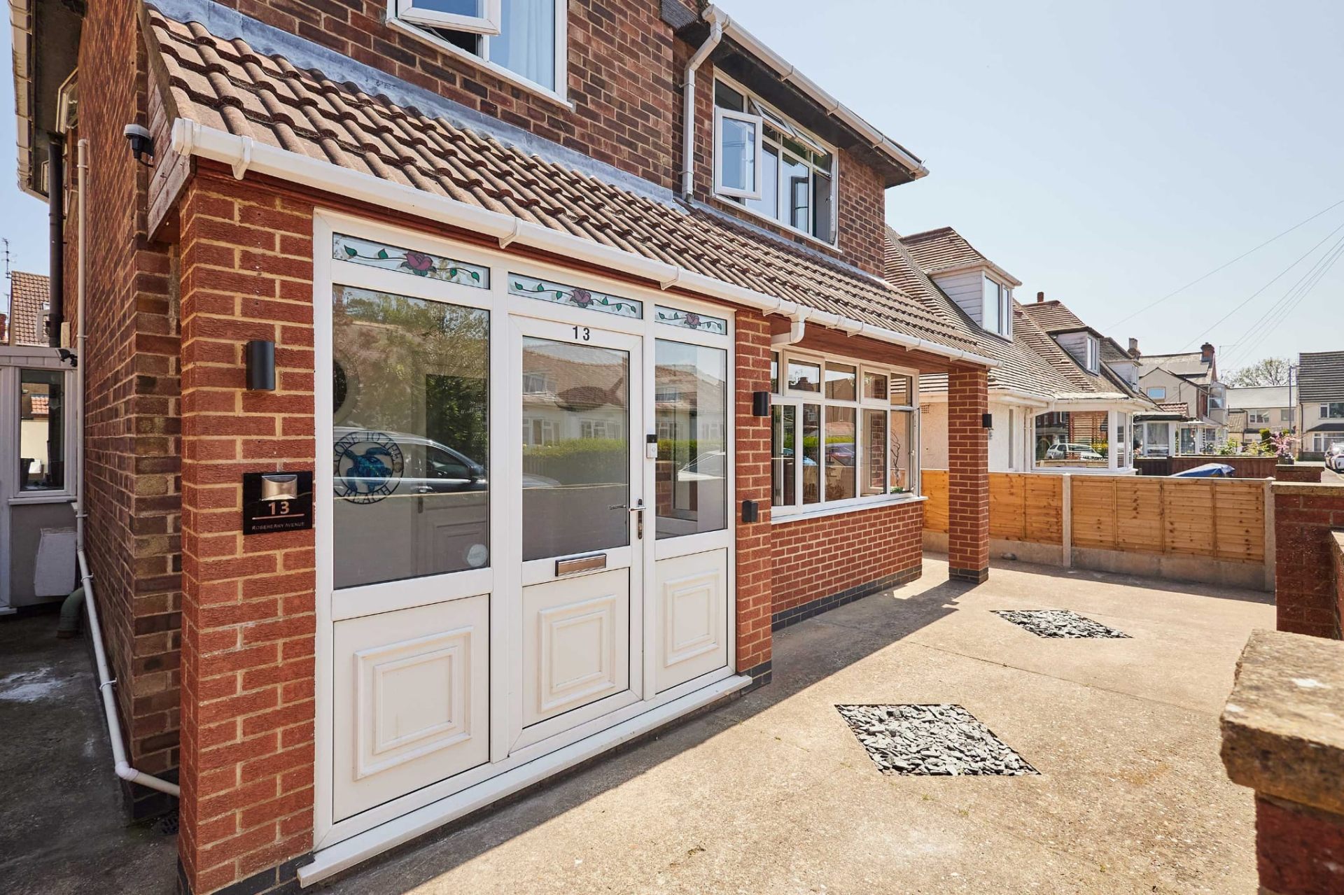 Front porch and stained-glass entrance to Sea Breeze Skegness